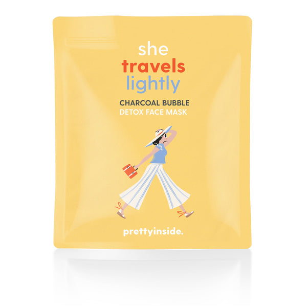 'She Travels Lightly' Charcoal Face Mask