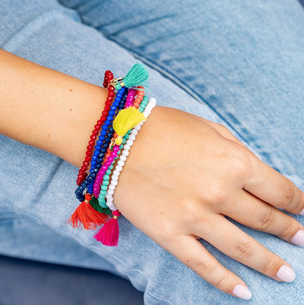 Patsy Solid Crystal Stretch Bracelet With Tassel - Coral